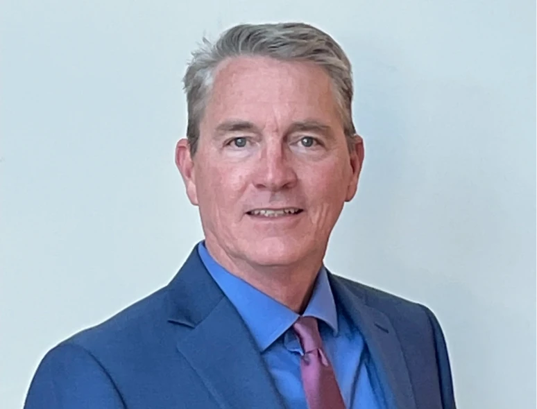 Businessman against plain background